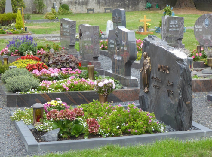 kerbed graves with autumn bedding